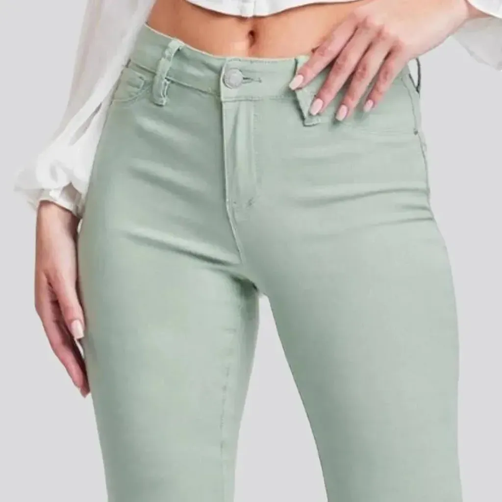 High-waist women's pale-green jeans