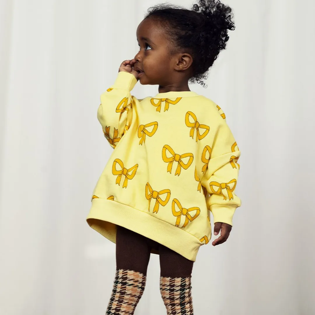 Organic Sweatshirt "Bow aop" - yellow