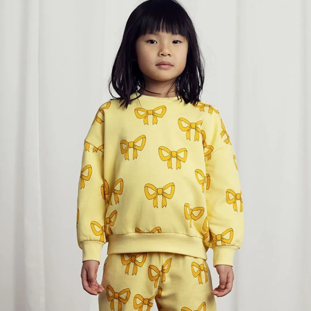 Organic Sweatshirt "Bow aop" - yellow