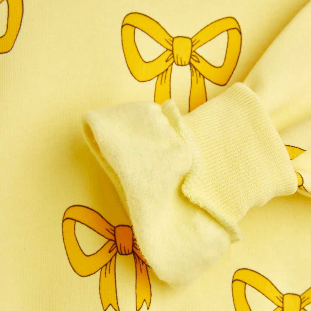 Organic Sweatshirt "Bow aop" - yellow