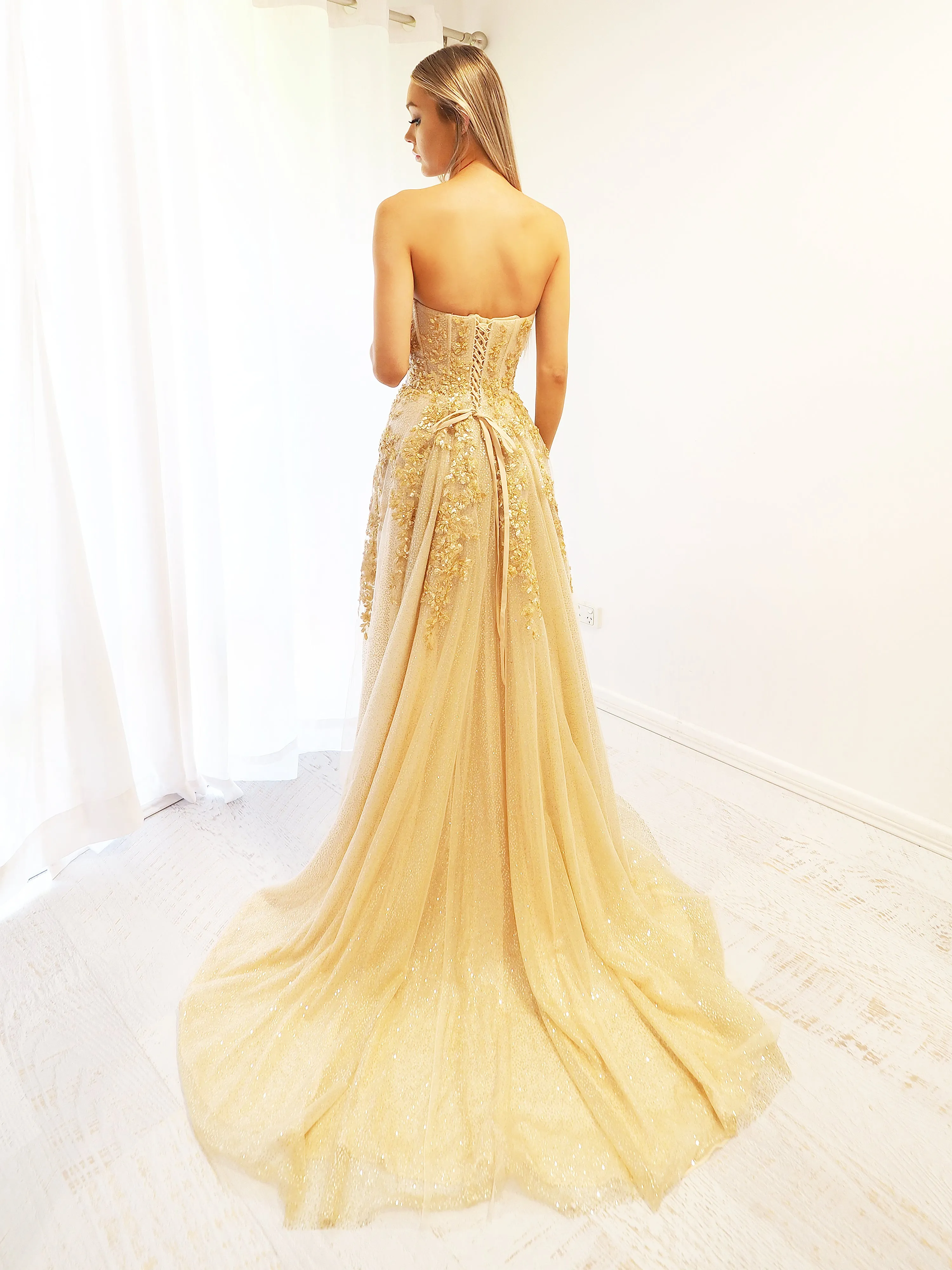 Sparkling gold bustier dress