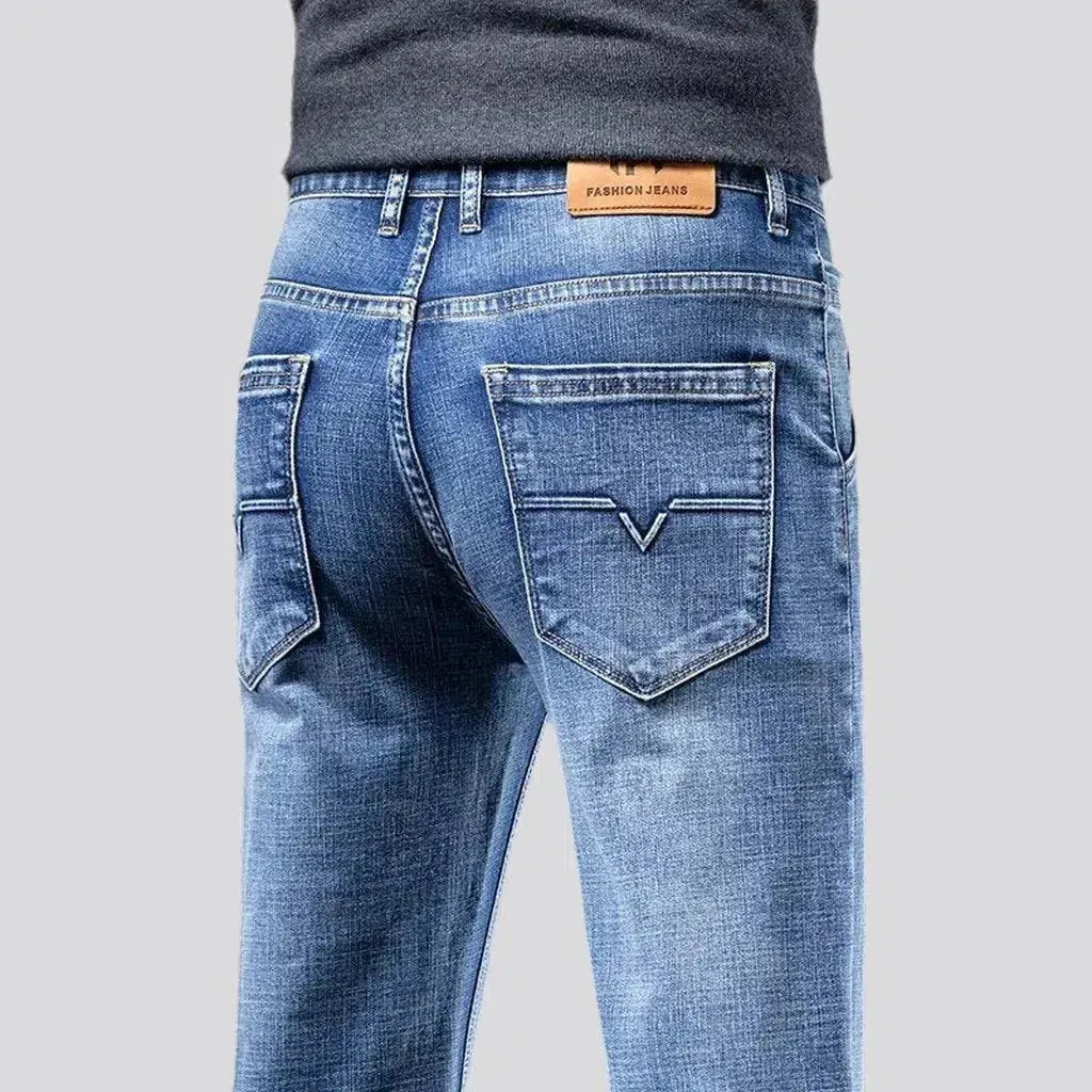 Tapered men's sanded jeans