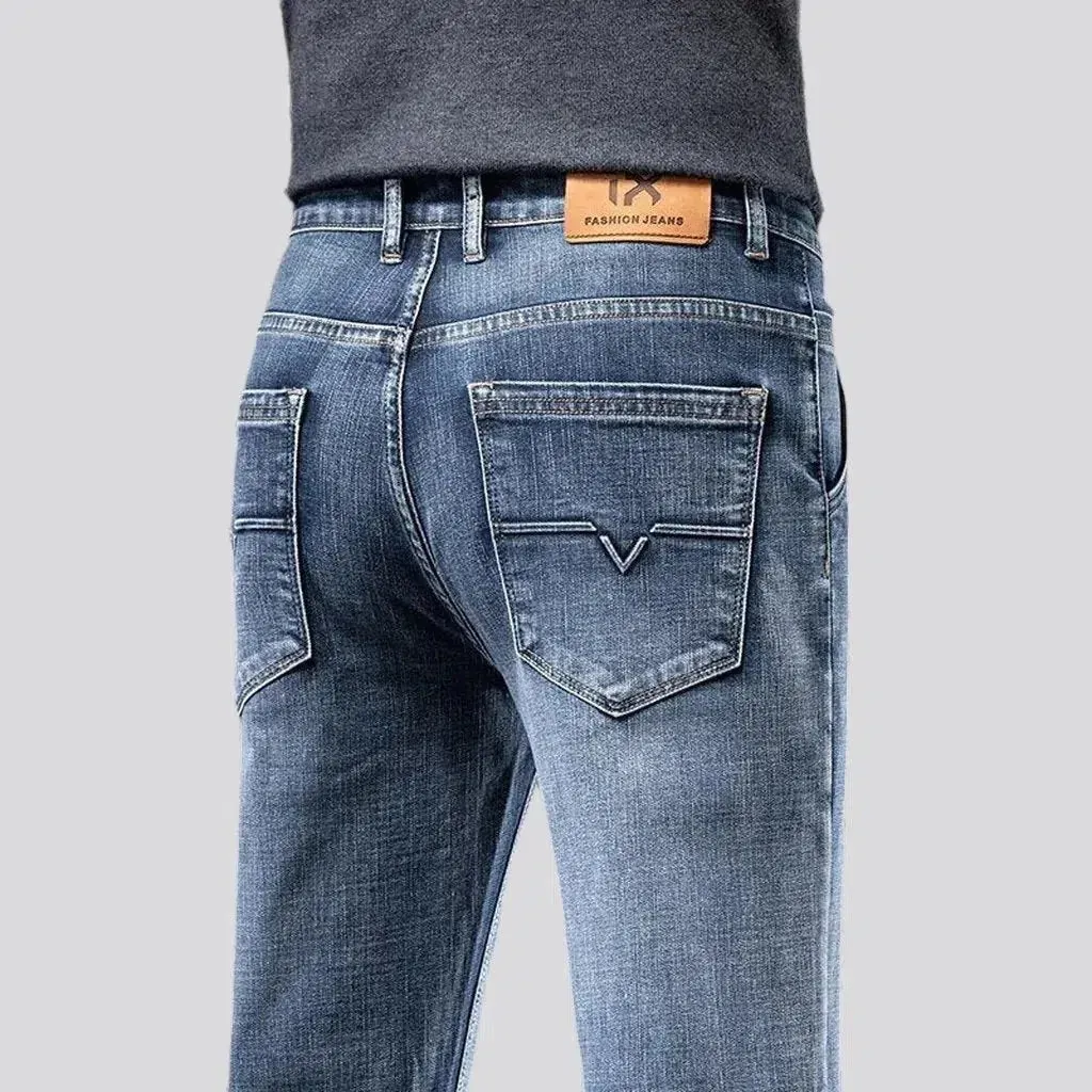 Tapered men's sanded jeans